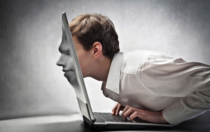 Addicted-To-Internet-Face-Out-Of-Laptop-Picture